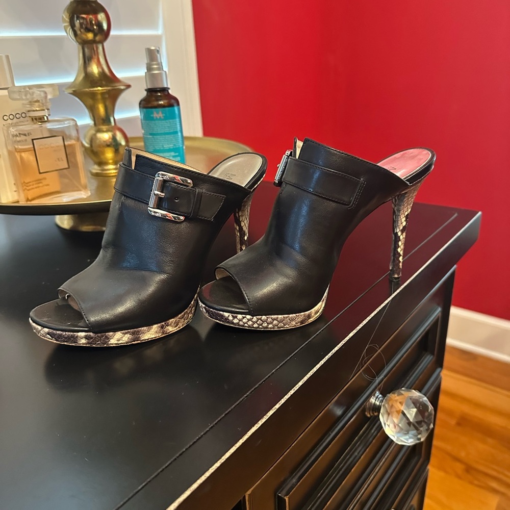Elegant Black Leather Mules with Snakeskin Heel